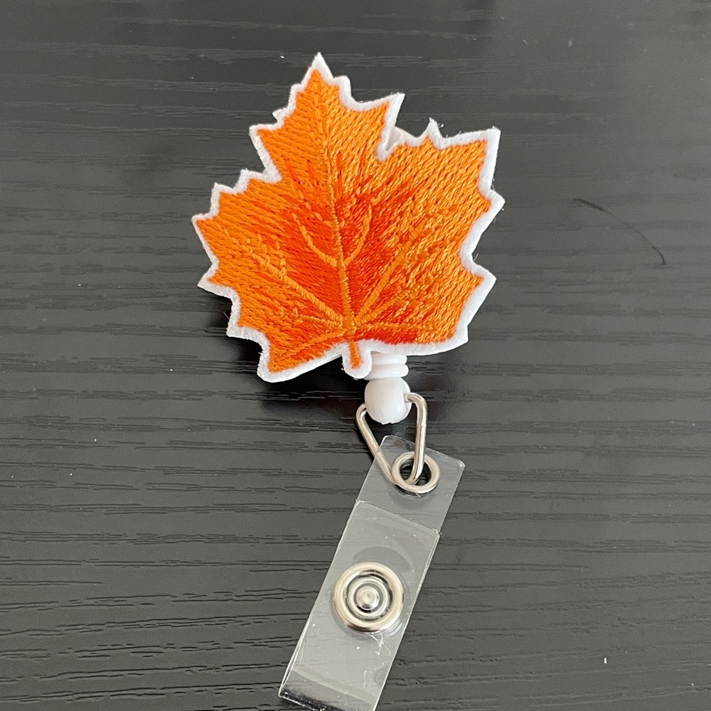 Orange Maple Leaf Badge Reel